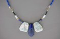 /album/cristal-vital-eveil-des-chakras/lapis-amazonite-motif-sur-cuir-60e-jpg/